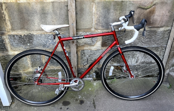 Genesis Day One disc road bike, metallic red