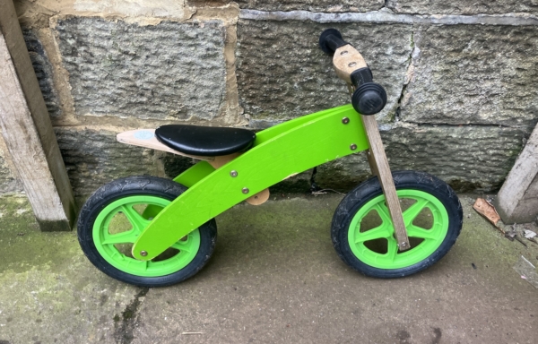 Wooden 12in balance bike, green